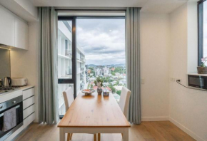 Modern 1 Bedroom with City Views Pool and Gym